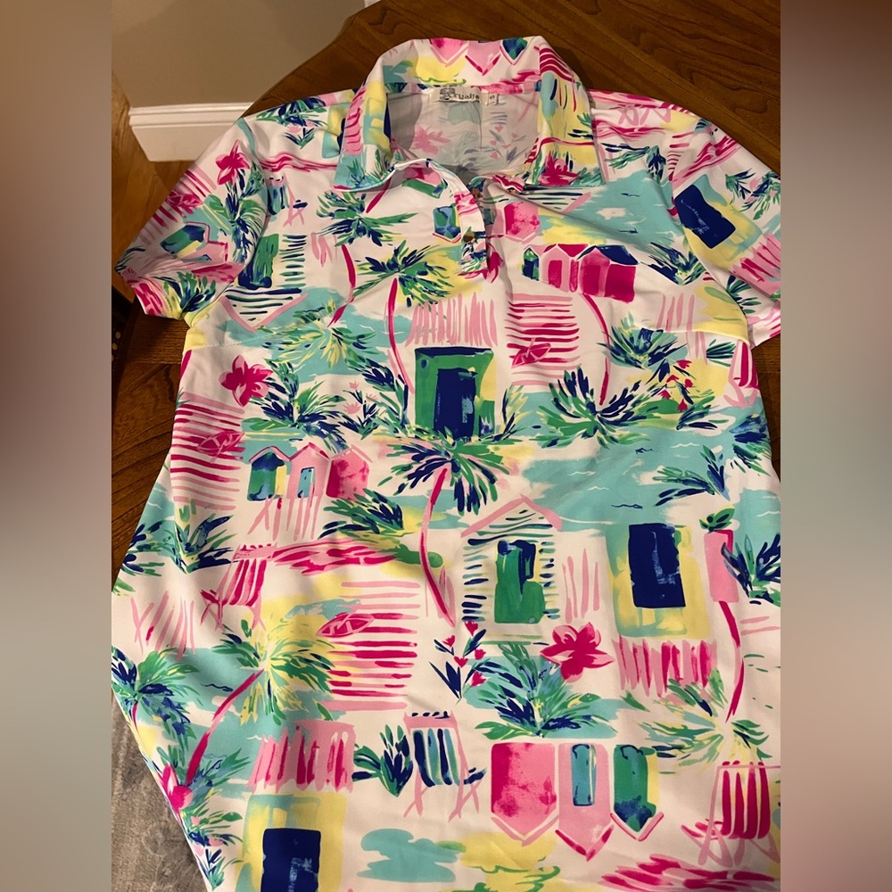 New women’s golf shirt by Aryeh size small